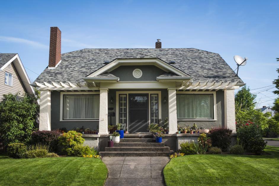 Residential home with newly installed charcoal shingles